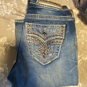 Mid rise Rock revival Yanka bootcut jeans. 27